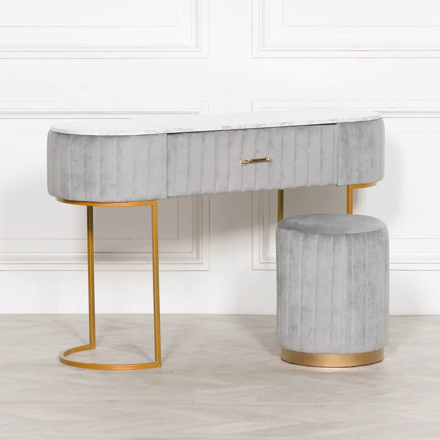 Grey velvet dressing table with gold metal legs and matching round stool