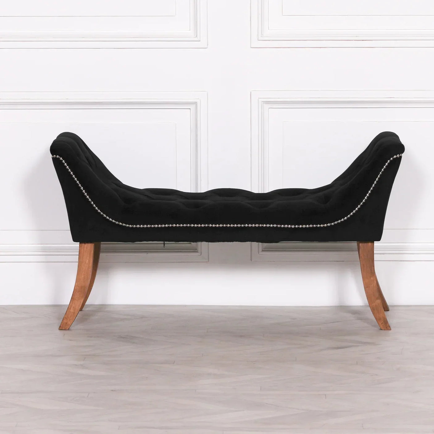 Black velvet bedroom bench with tufted seat, stud detailing and curved wooden legs