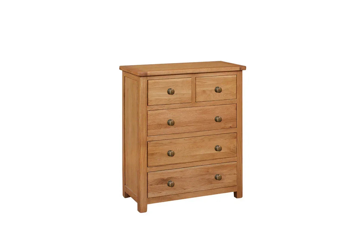 Oak 5 drawer chest with round metal handles, shown angled against a plain white background