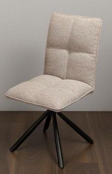 Beige fabric dining chair with cushioned seat and black swivel legs on wooden floor