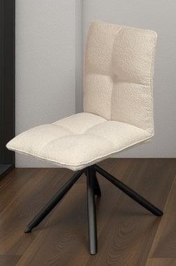 White upholstered dining chair with padded seat and black metal swivel base on wooden floor