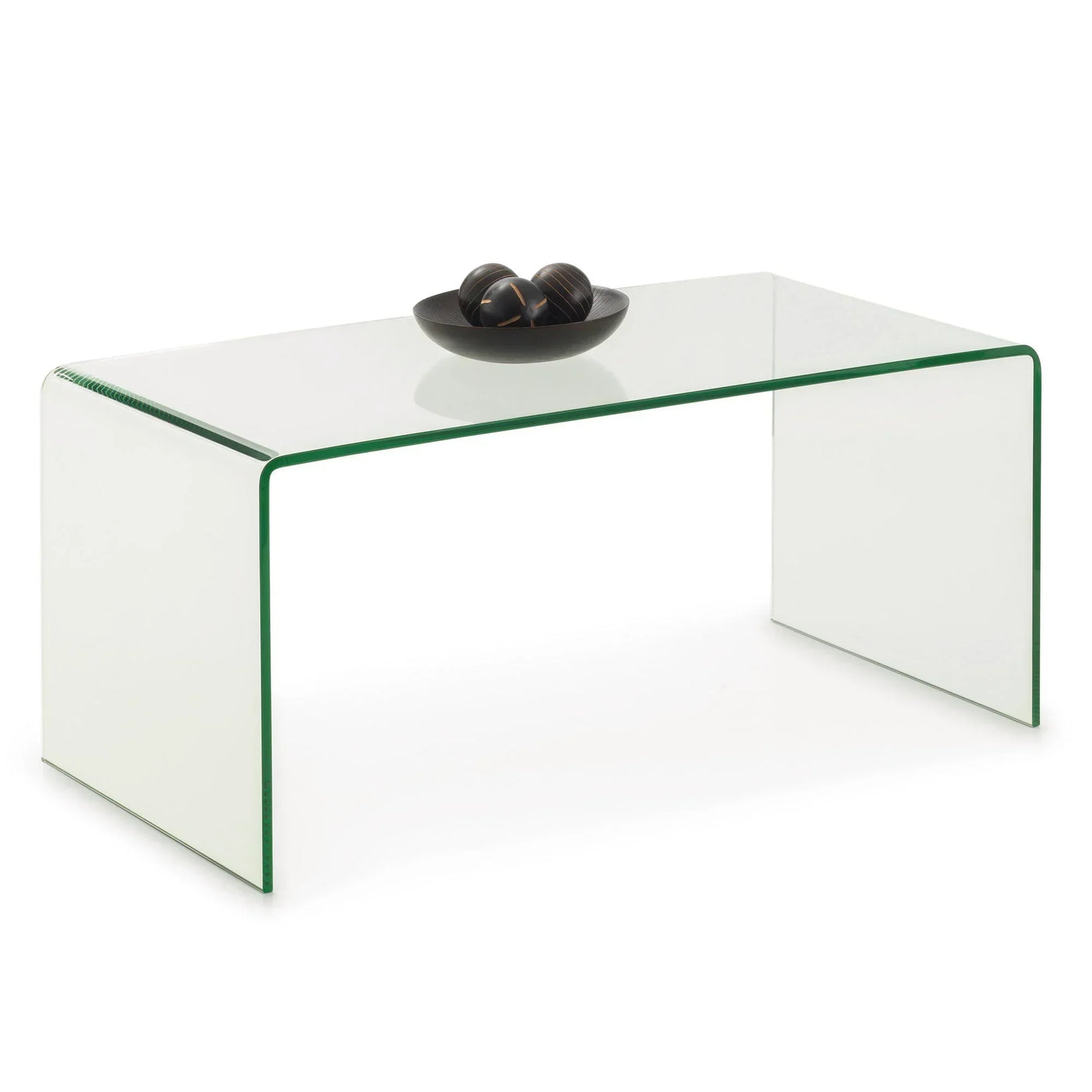 Glass coffee table with curved edges and decorative bowl on top, white background