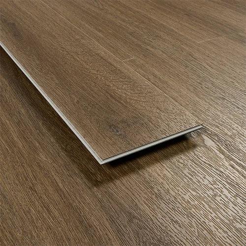 Antique walnut laminate flooring plank on wood grain surface, close up of texture and edges