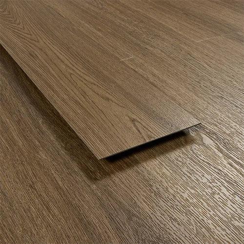 Antique walnut laminate flooring plank showing wood grain and brown finish