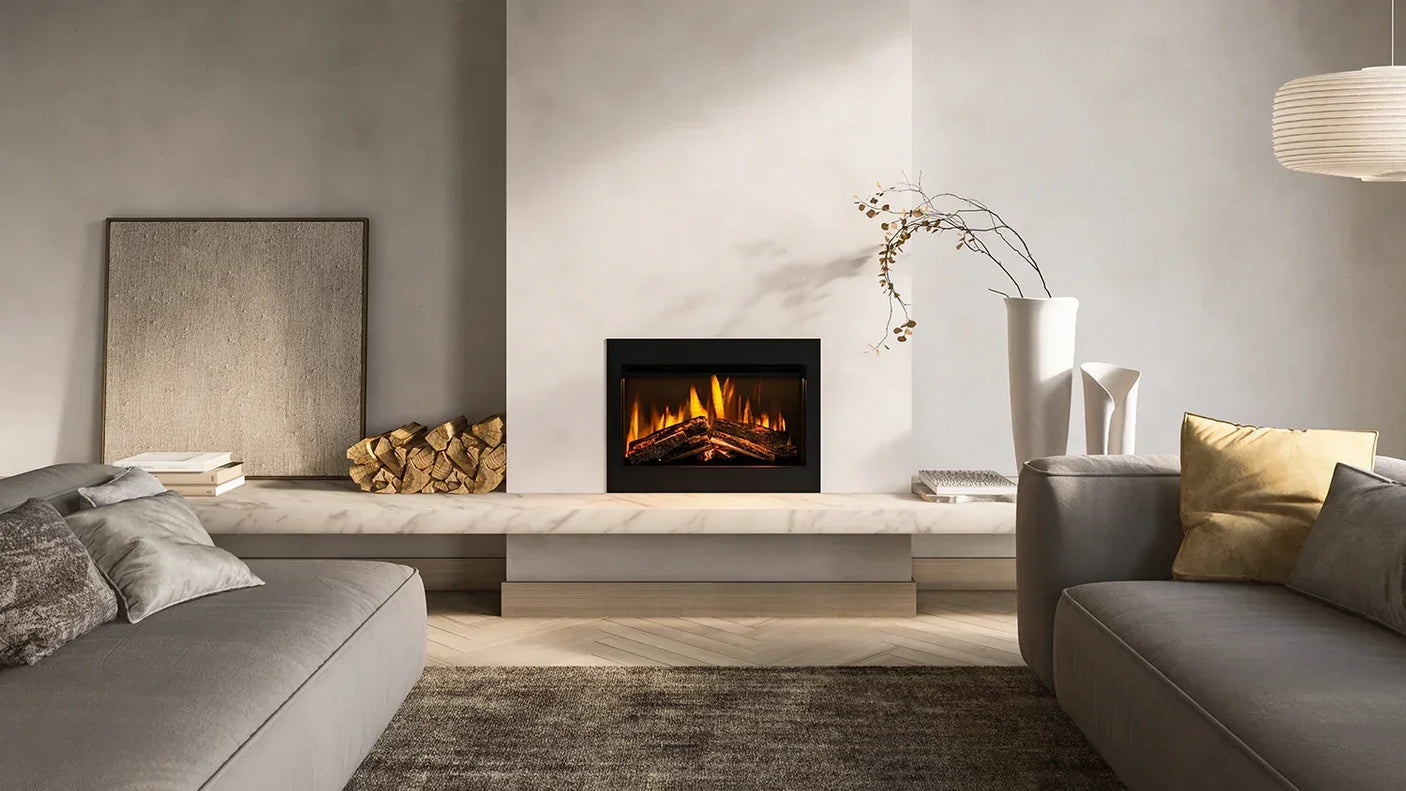 Modern living room with electric fireplace, grey sofas, and marble hearth