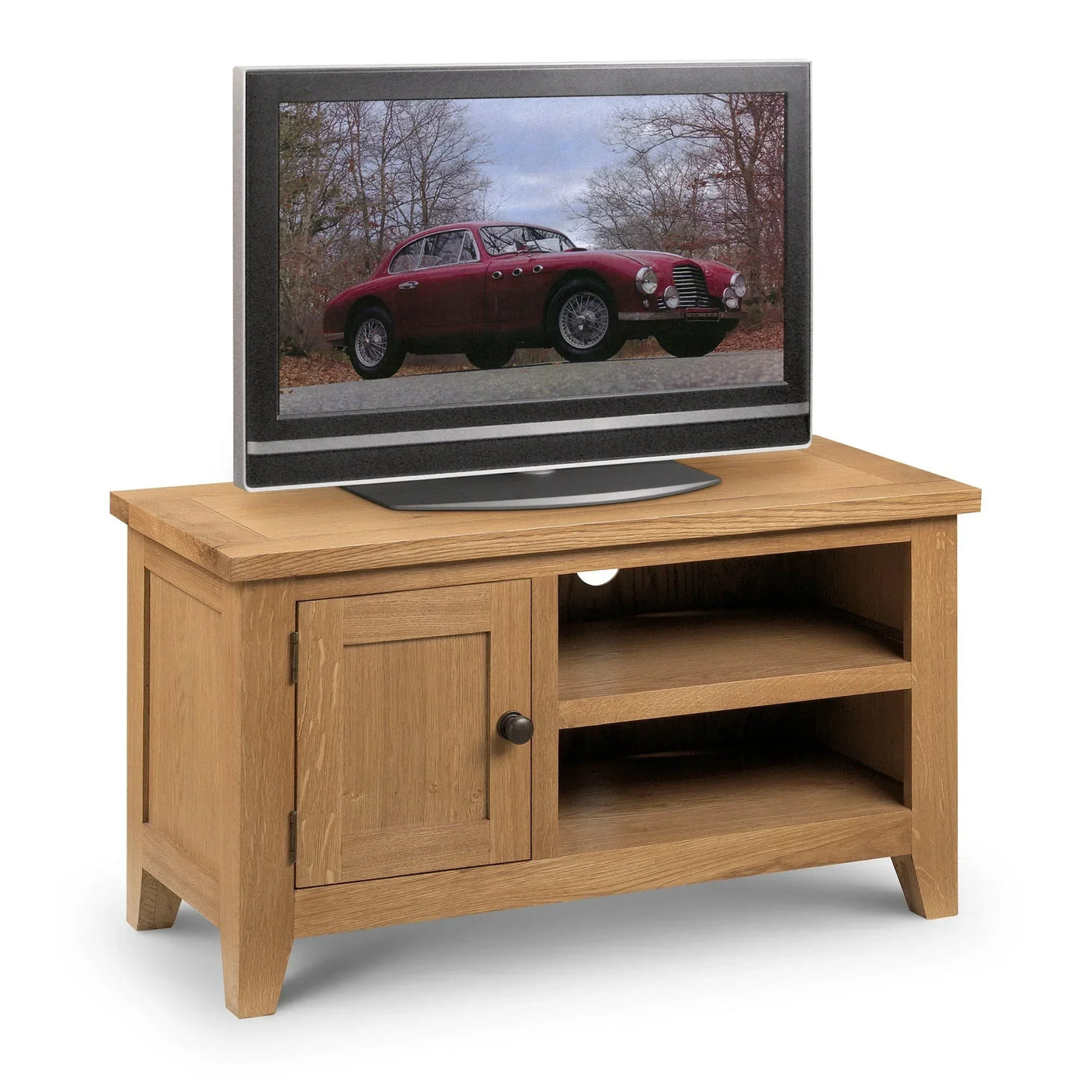 Oak TV unit with cabinet door and open shelves for media storage, shown with television