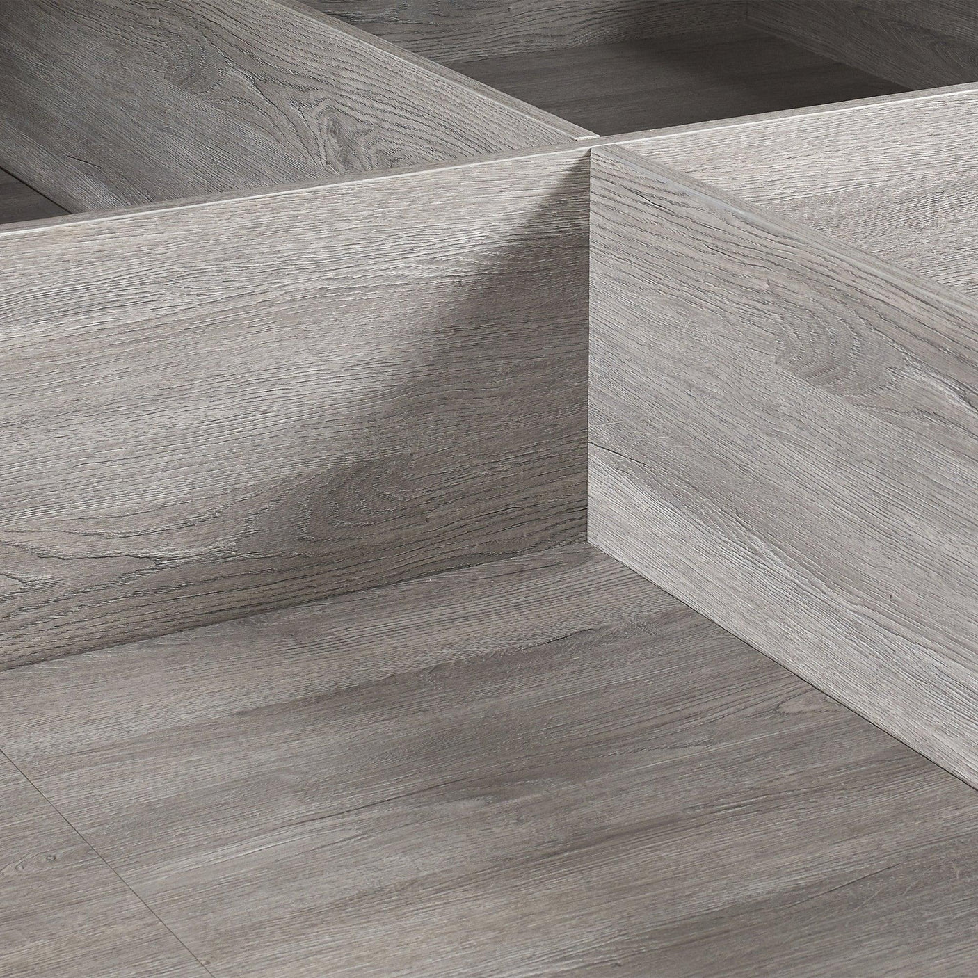 Grey oak ottoman storage bed interior with wood grain finish and divided compartments