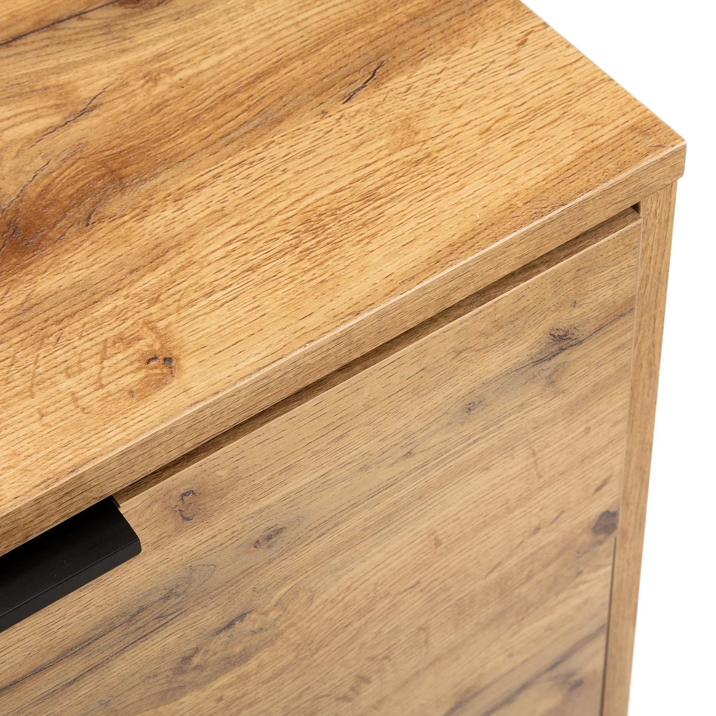 Close up of Bali 6 drawer chest oak wood grain and corner detail