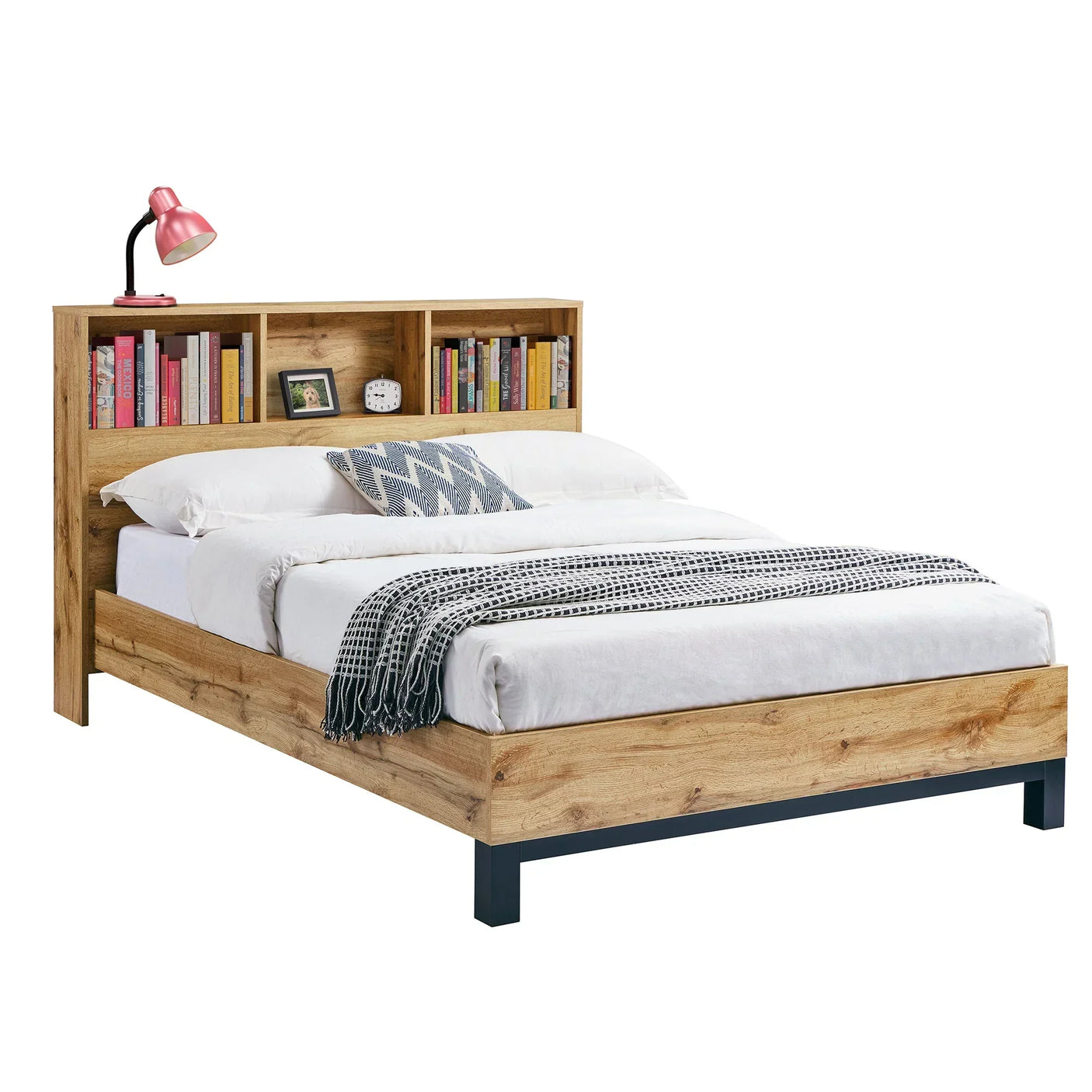 Oak effect double bed with headboard shelves, books, lamp and modern bedding