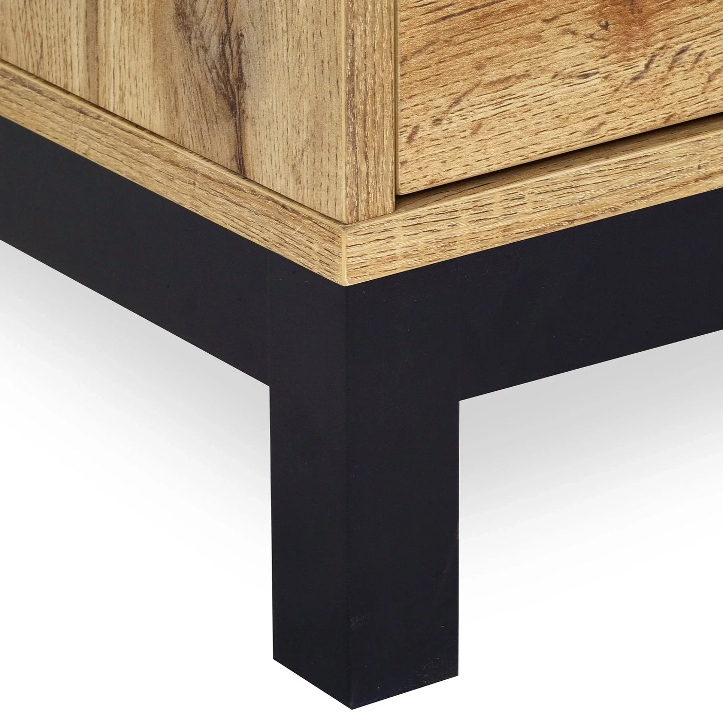 Light oak TV unit corner with black metal leg close-up