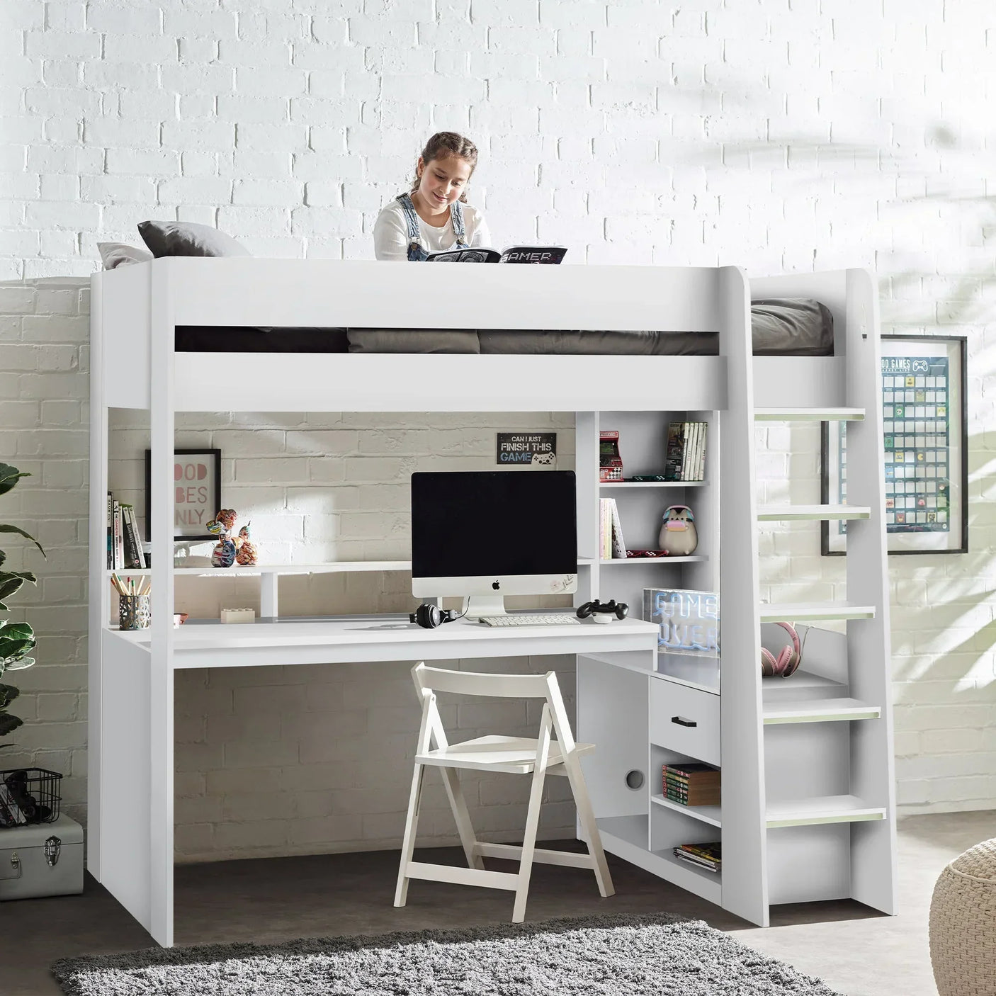 White gaming highsleeper bed with built-in desk, bookshelves, and computer in modern bedroom