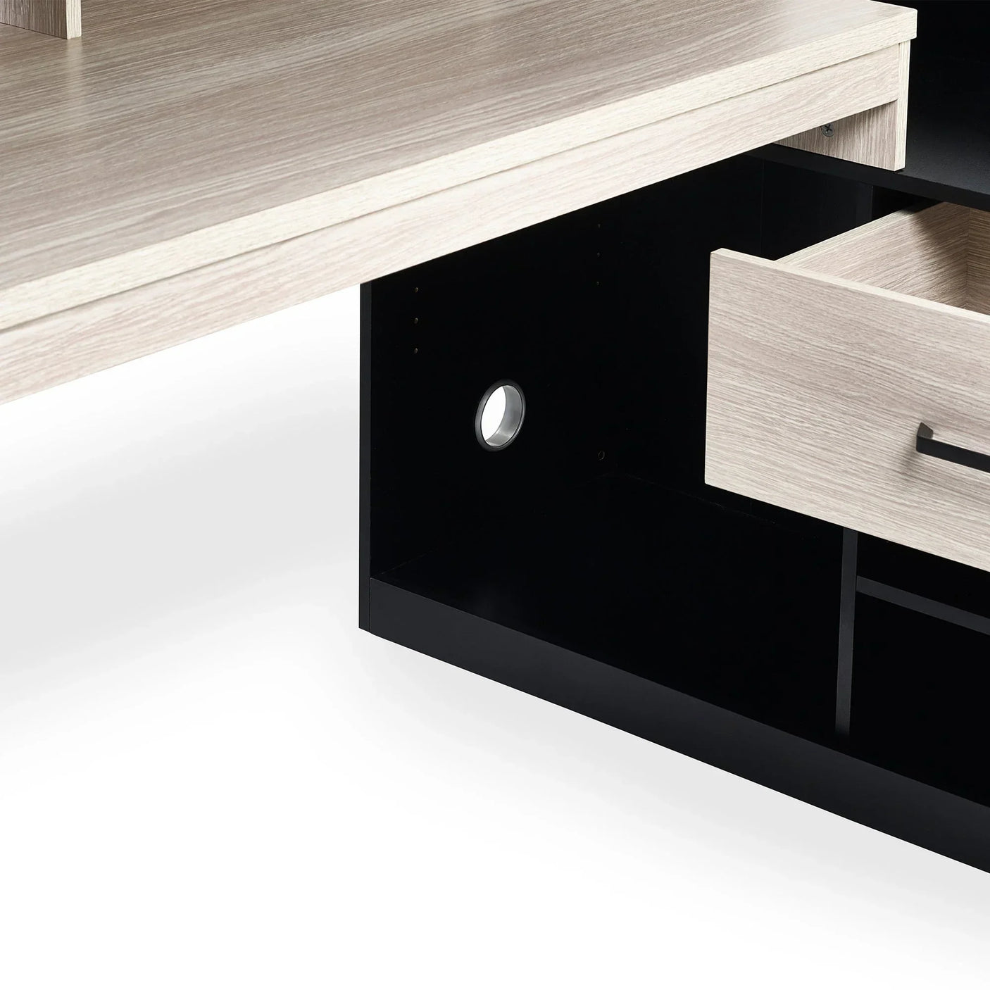 Blaze gaming highsleeper desk with pale wood finish, open drawer, cable hole detail