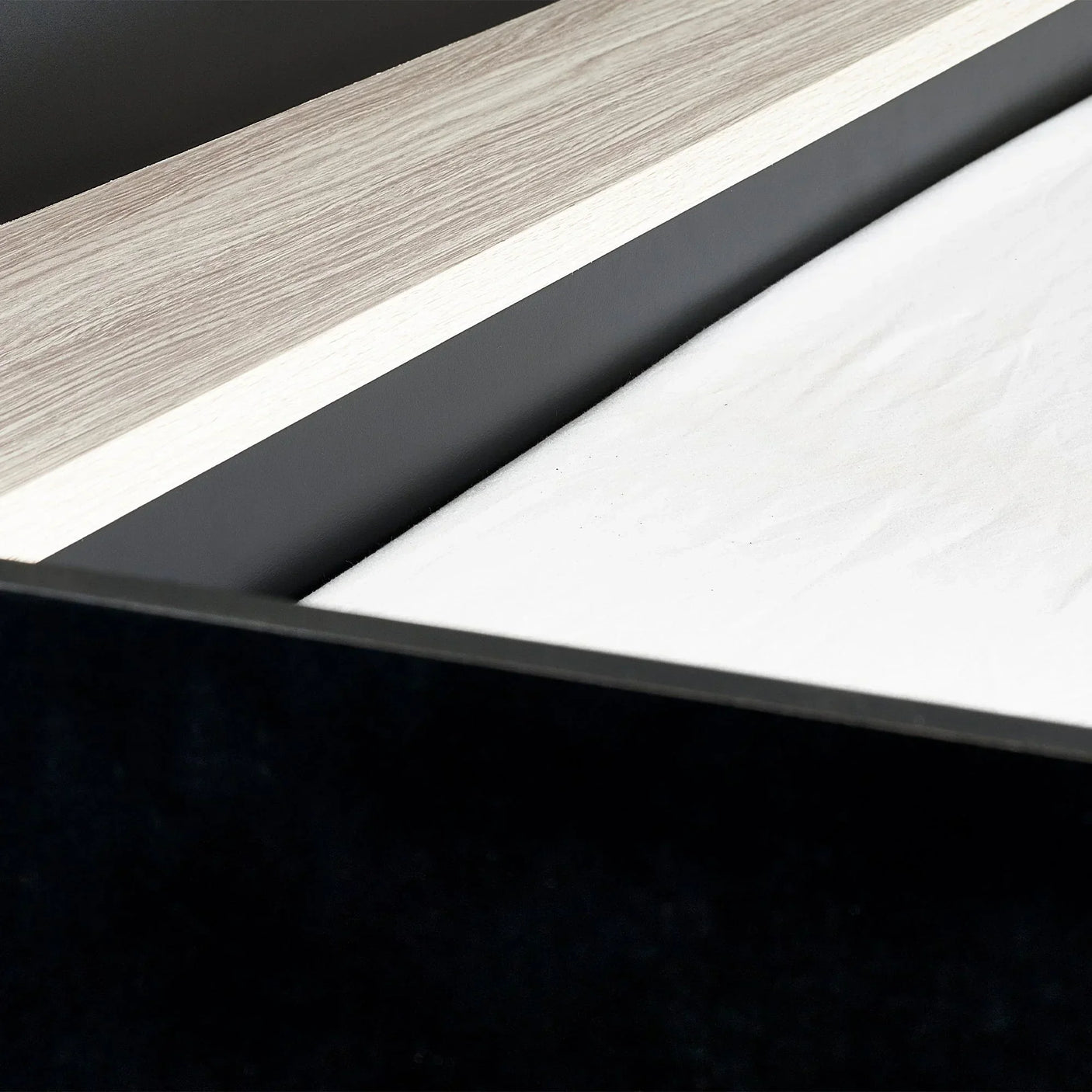 Highsleeper bed frame detail with black and pale wood finish