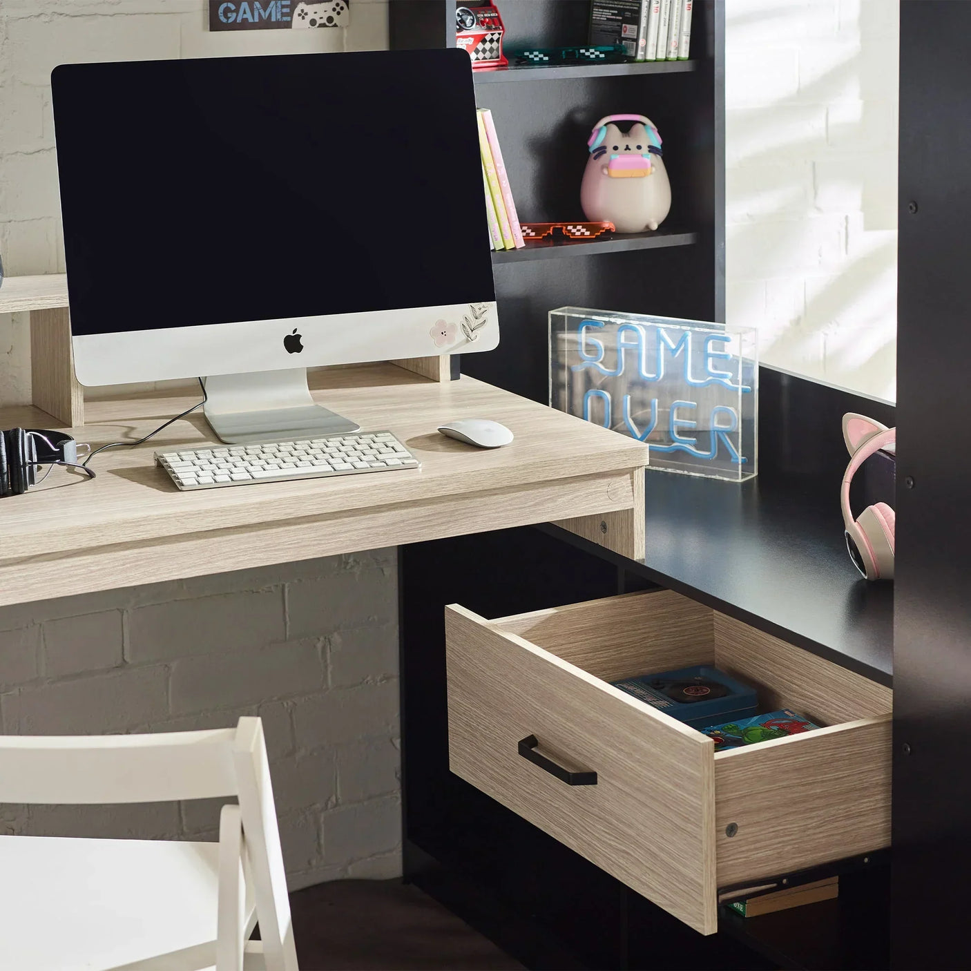Blaze gaming highsleeper desk in black and pale wood with computer, drawer, and accessories