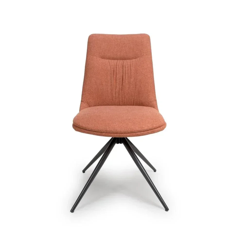 Rust fabric dining chair with black metal legs, front view