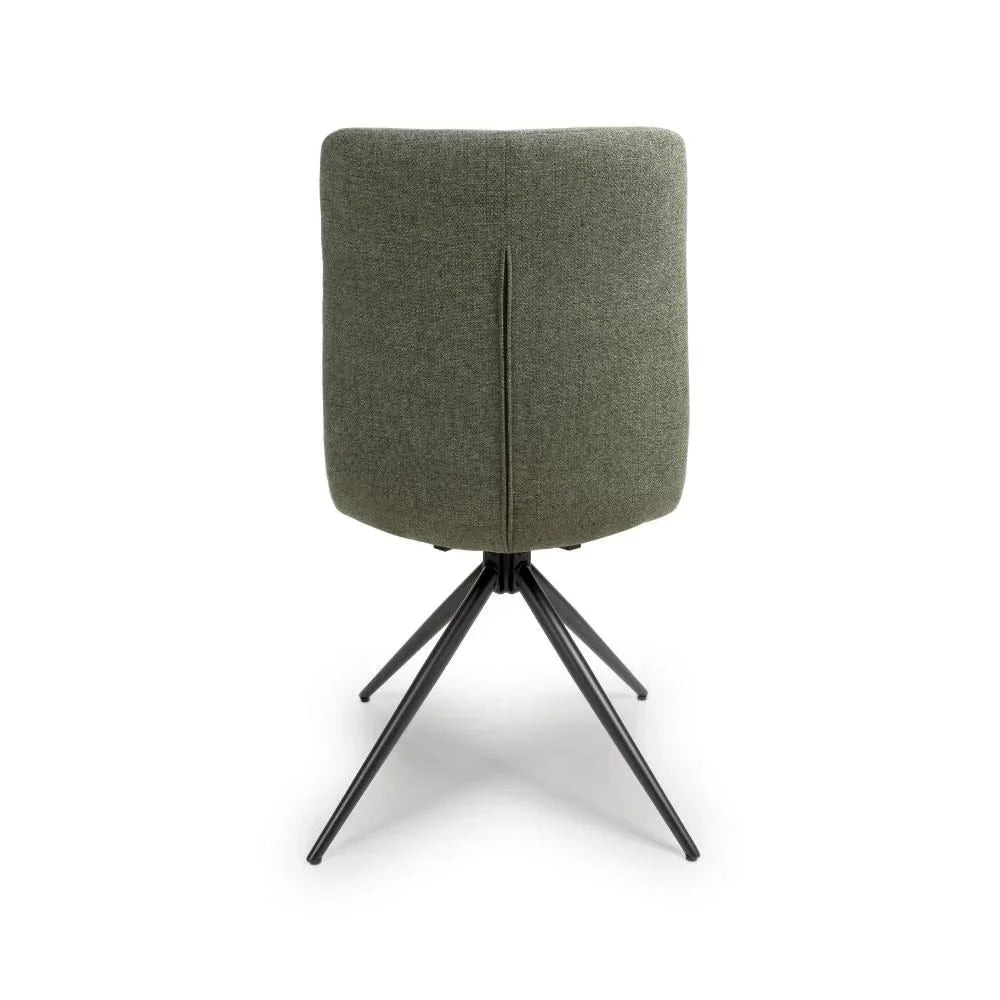 Green fabric dining chair rear view with black metal legs and modern design