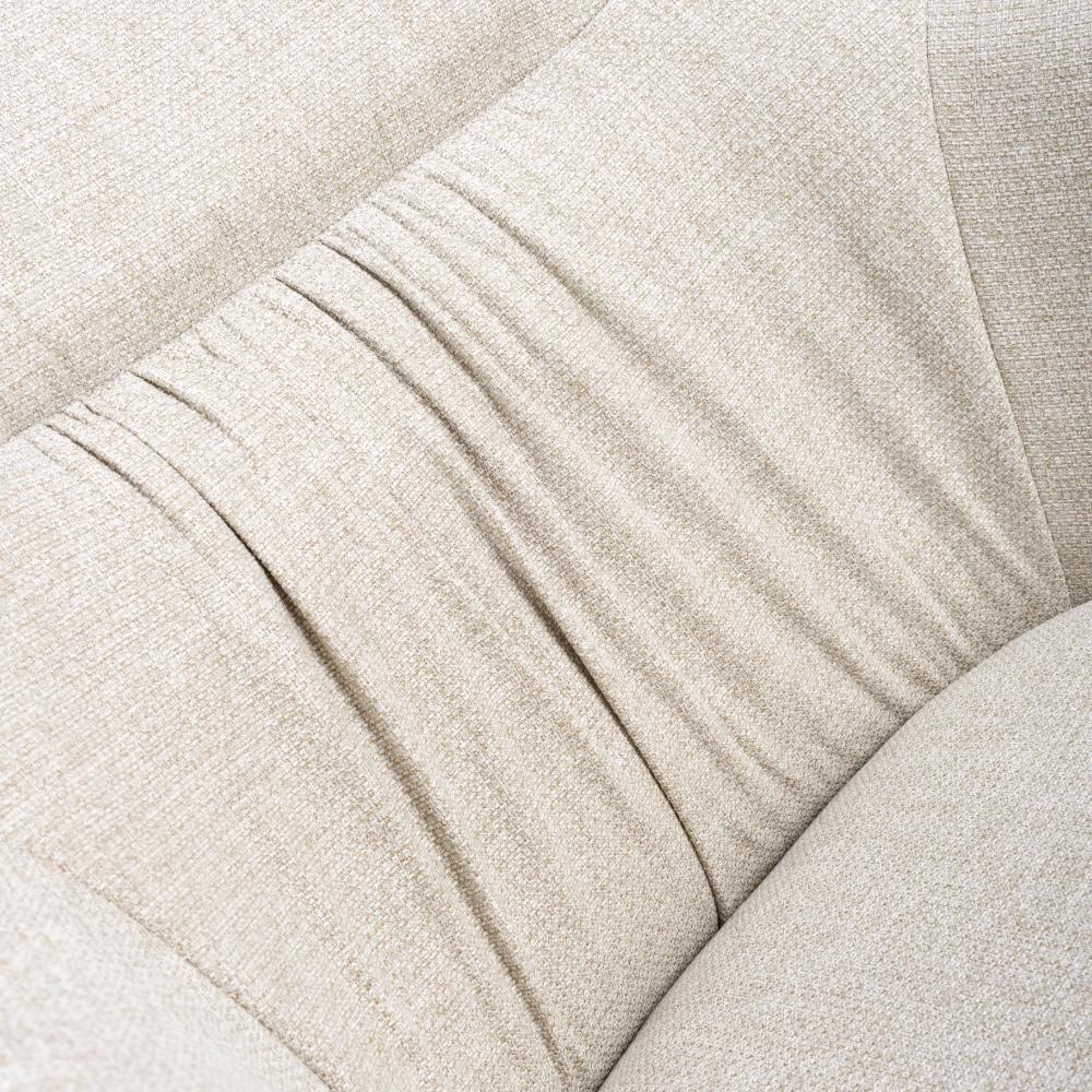 Close up of beige fabric sofa cushion with textured upholstery and stitched detail