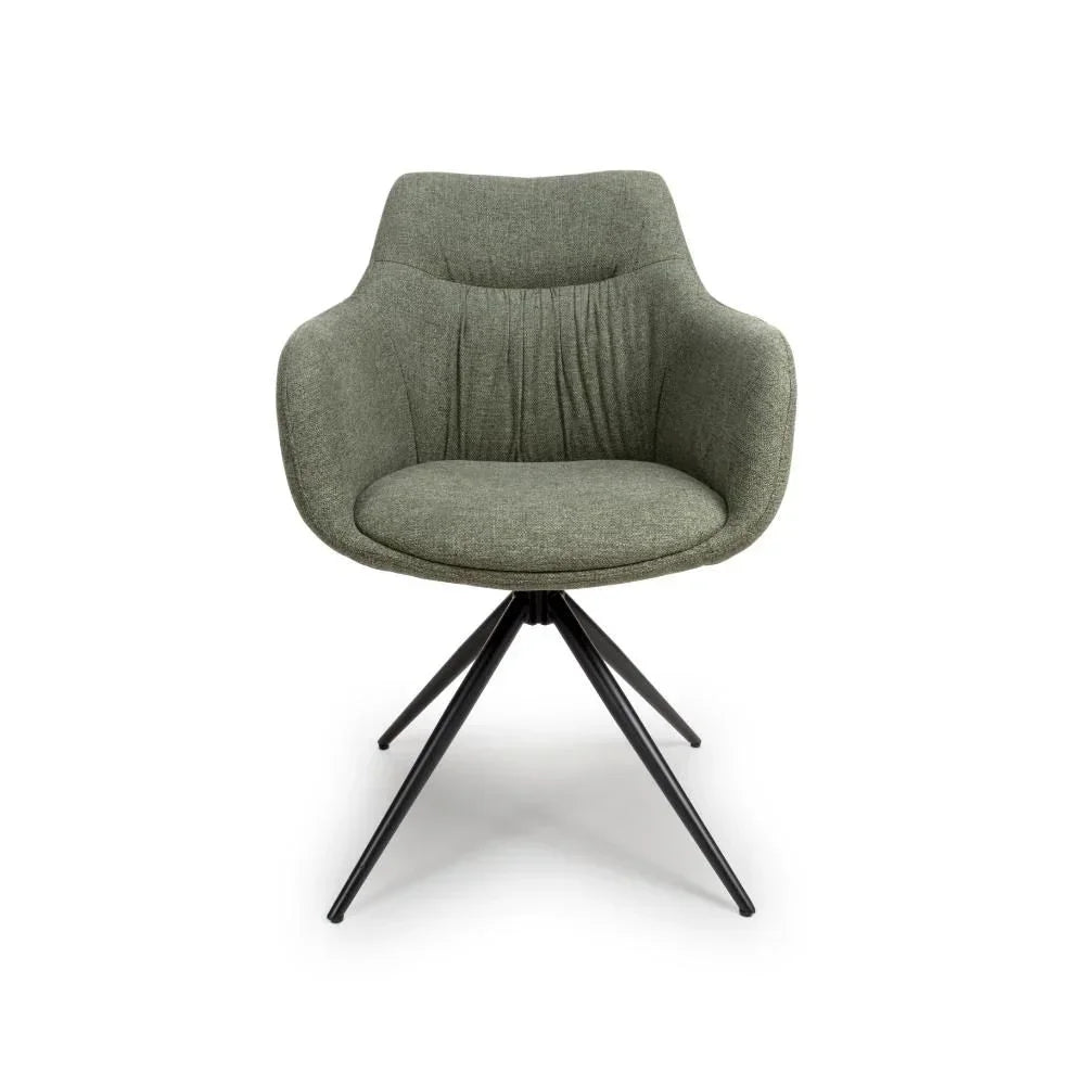 Green fabric dining chair with black metal legs and curved armrests, front view