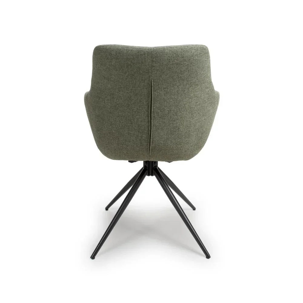 Green fabric dining chair with black metal legs, rear view