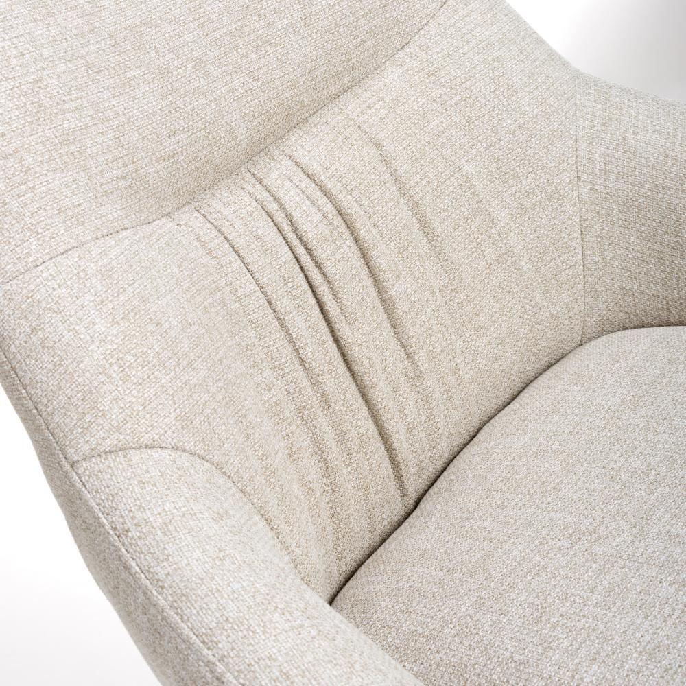 Beige fabric armchair with textured upholstery and curved backrest, close-up view