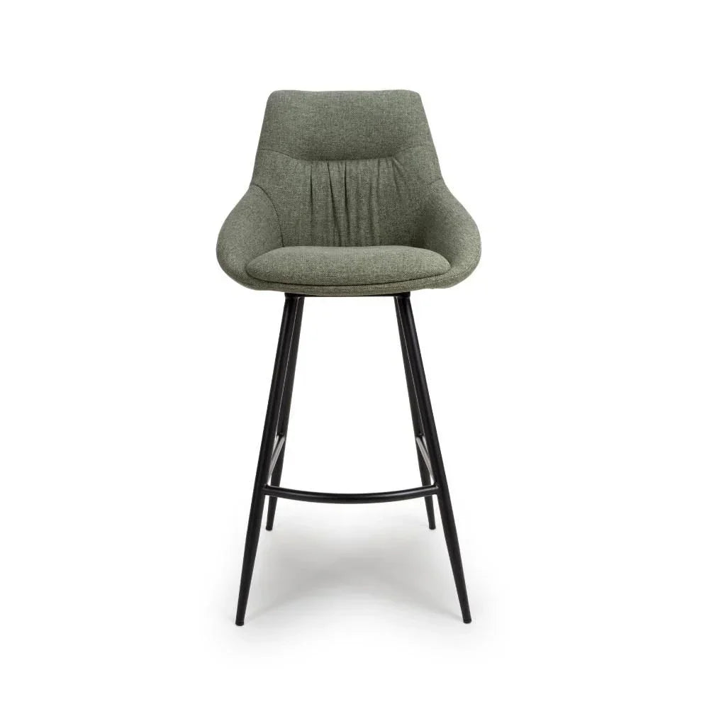 Green fabric bar stool with curved backrest and black metal legs, front view