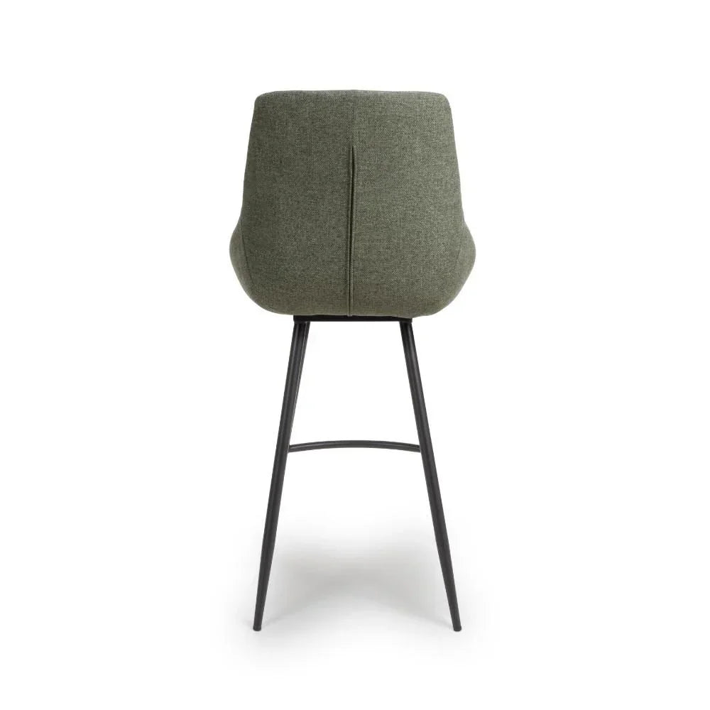 Green fabric bar stool with black metal legs, rear view showing curved backrest