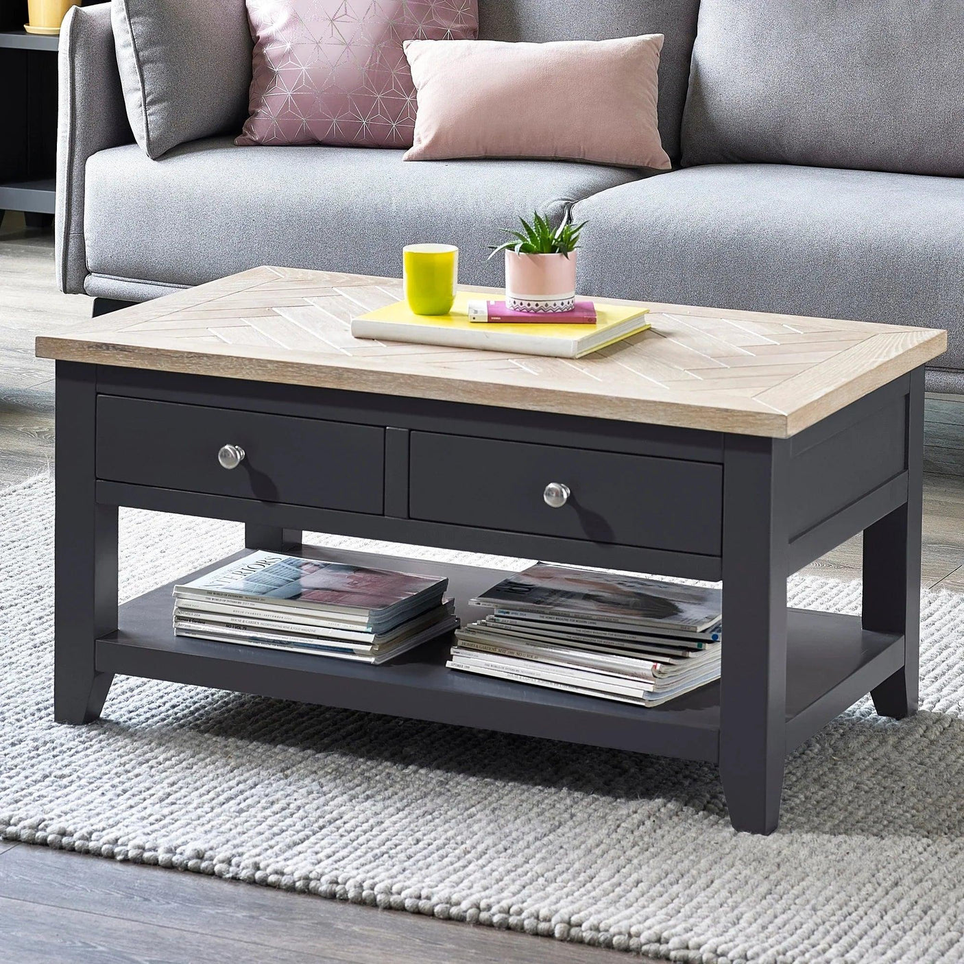 Bordeaux coffee table with two drawers, wood top, magazines on shelf, in modern living room