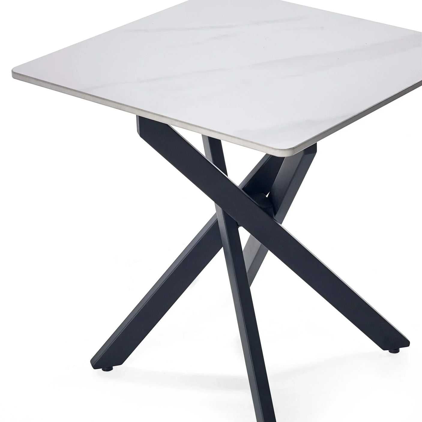 White marble lamp table with black crossed metal legs, angled detail view