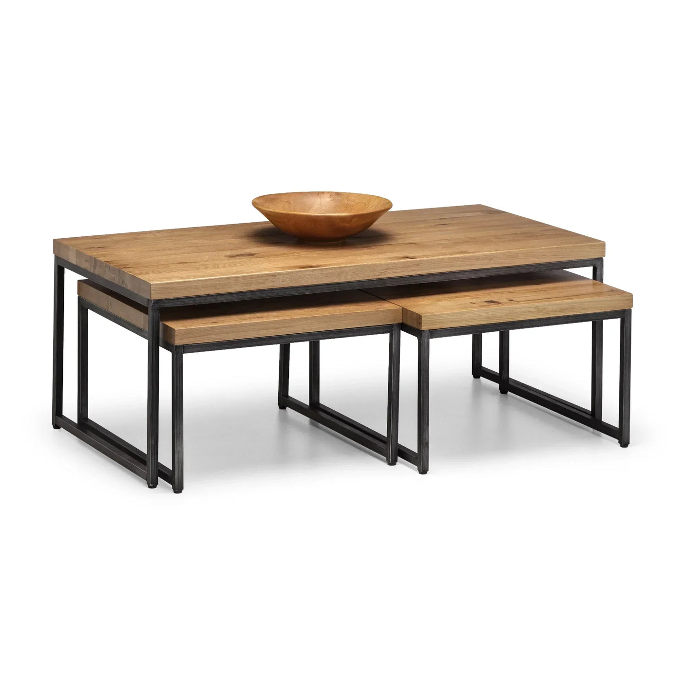Nesting coffee tables with wood tops and black metal frames, bowl decor on large table