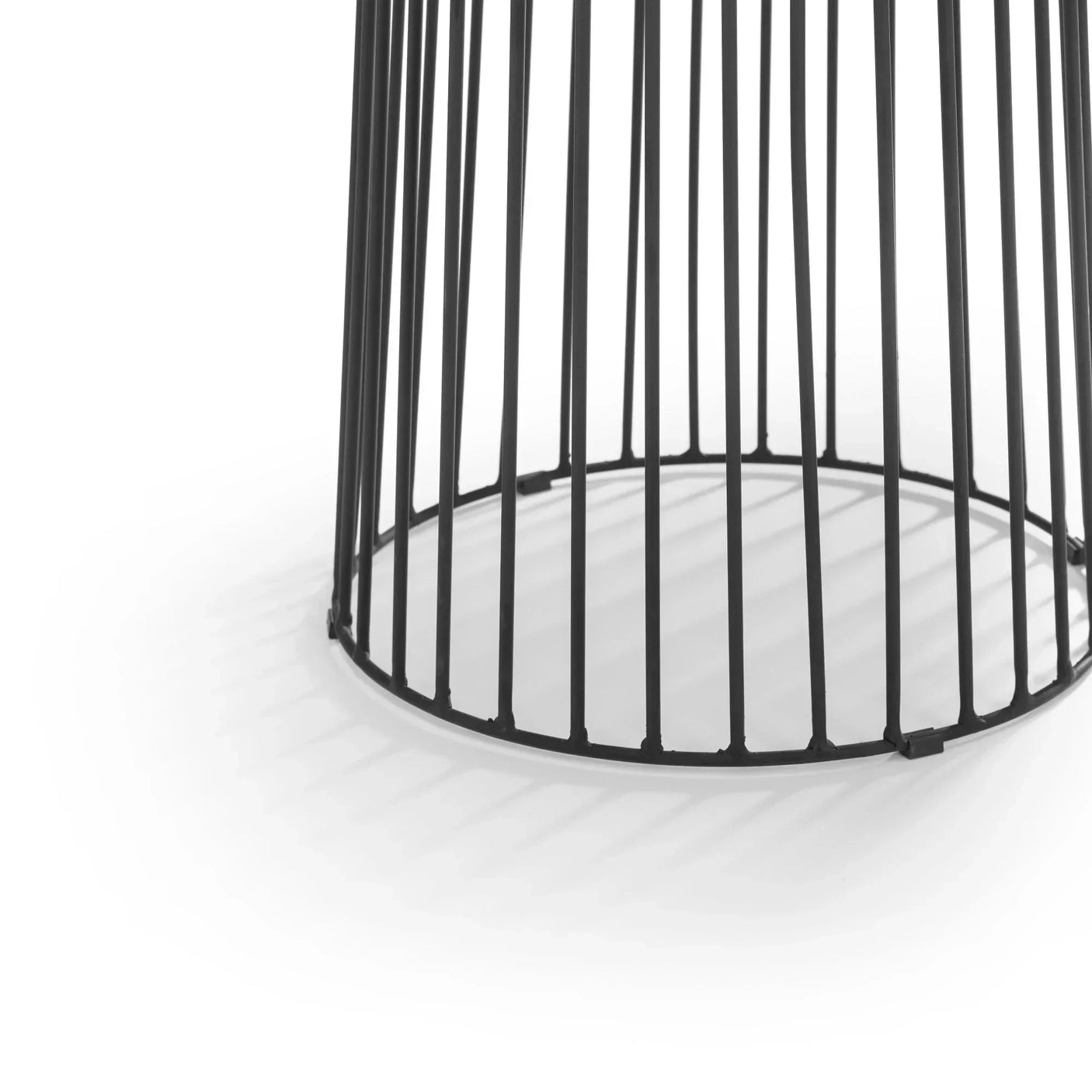 Black metal wire frame table base on white background