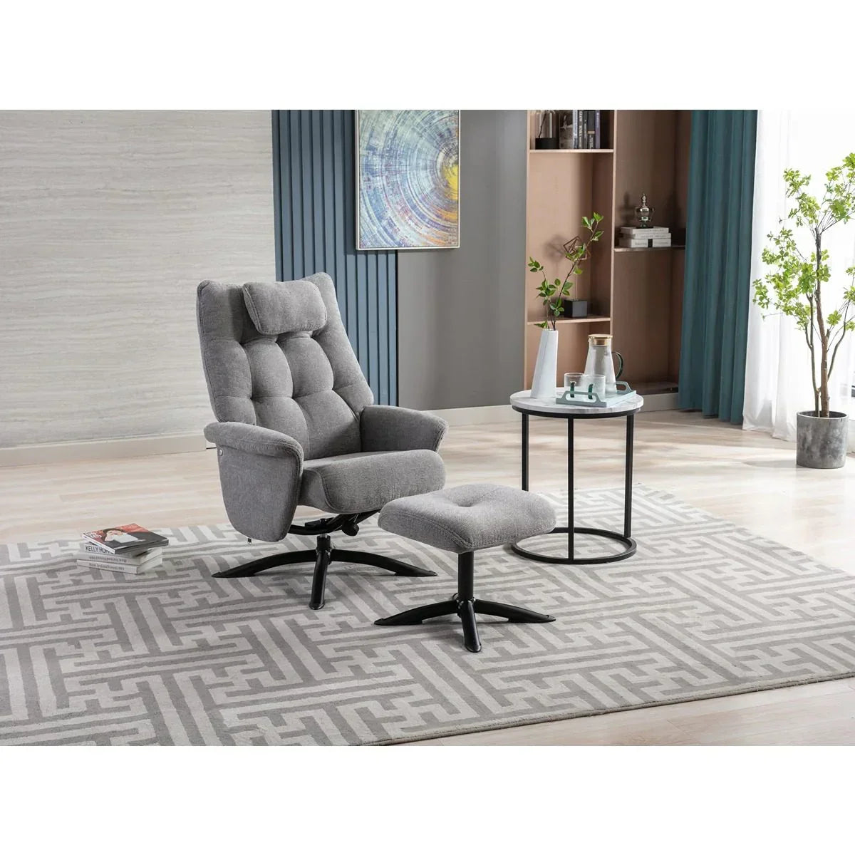 Grey fabric recliner chair with matching footstool on patterned rug in modern living room