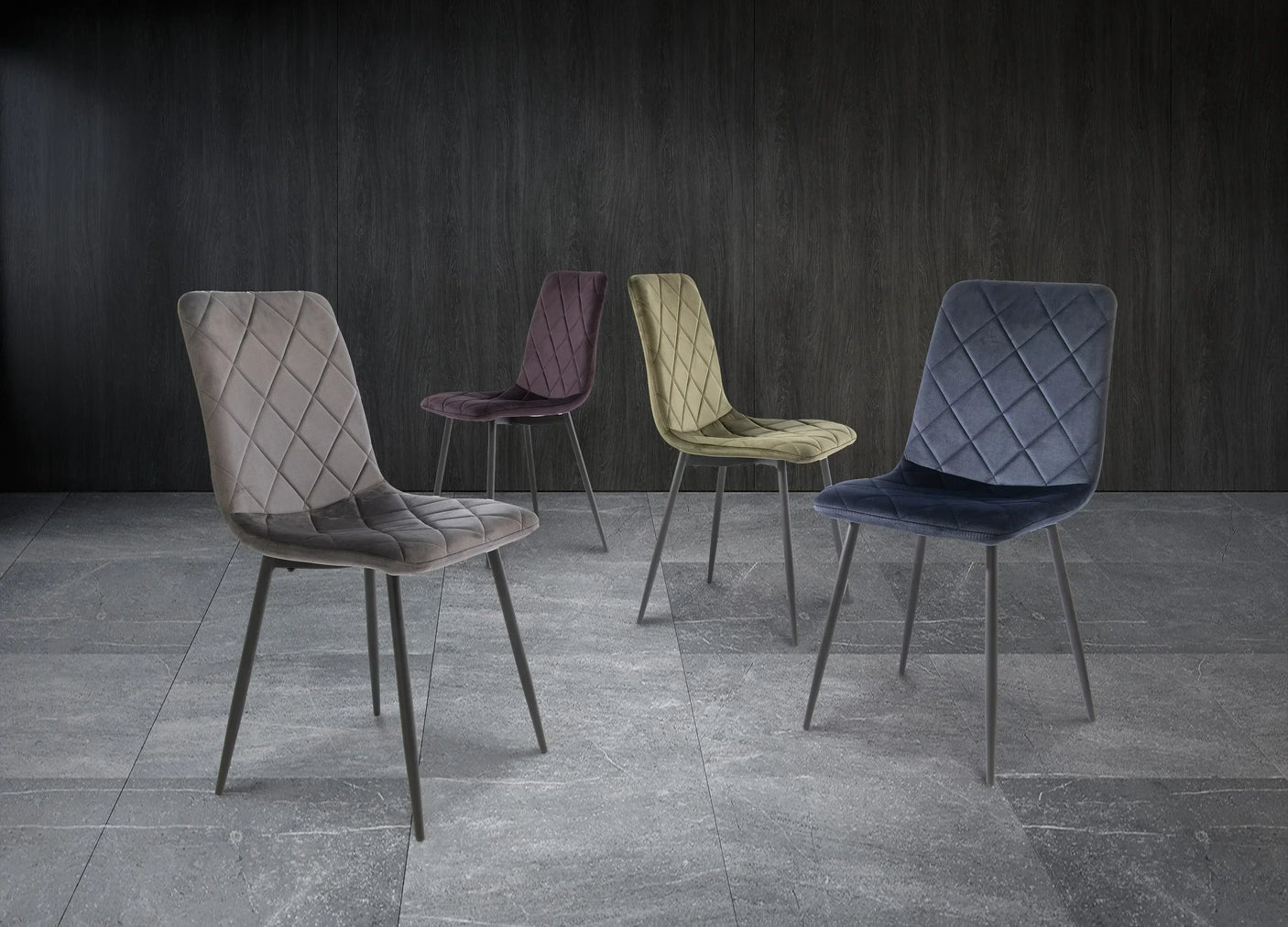 Set of four velvet dining chairs in grey, purple, olive, and navy with metal legs