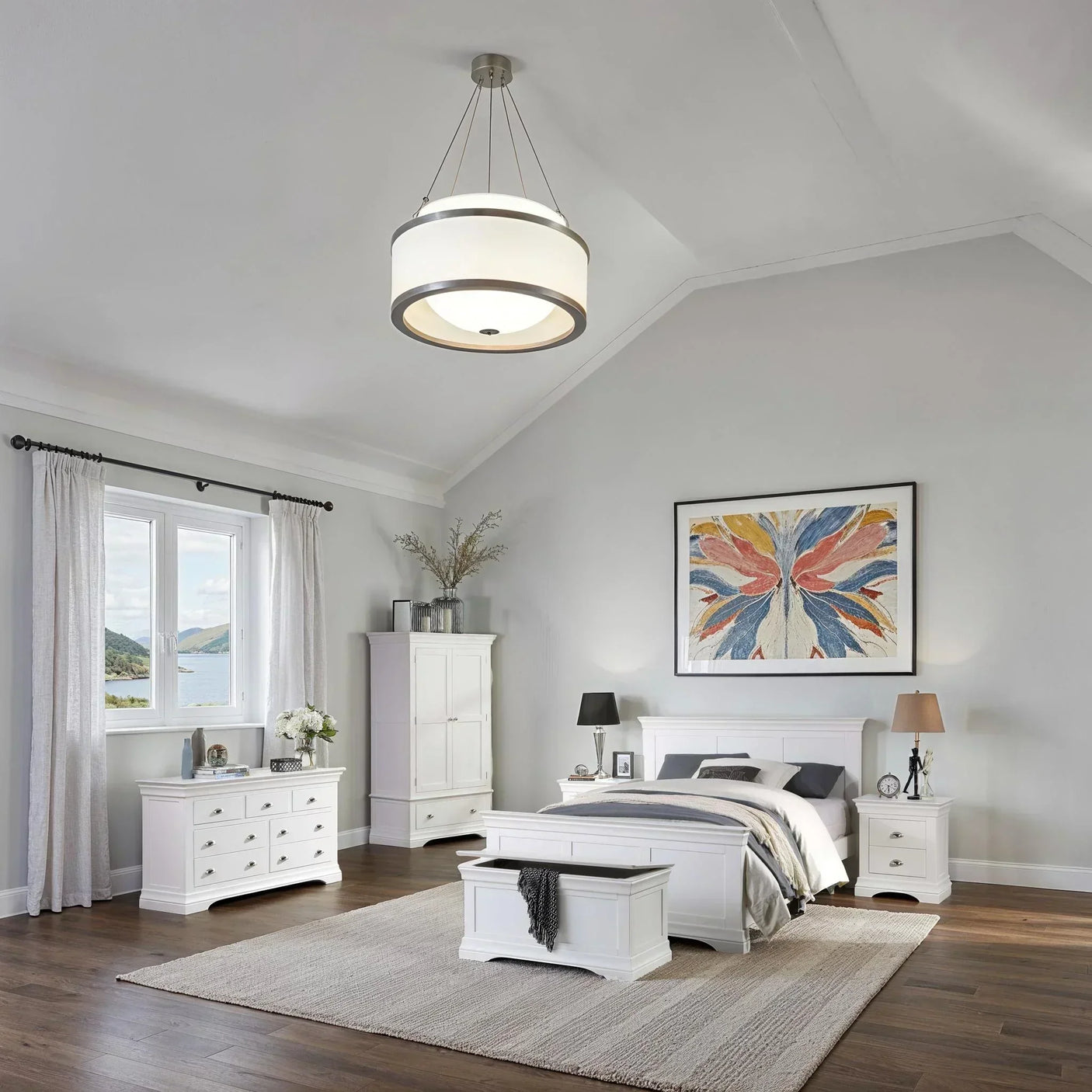 White bedroom furniture set with bed, drawers, wardrobe and bench on wood floor