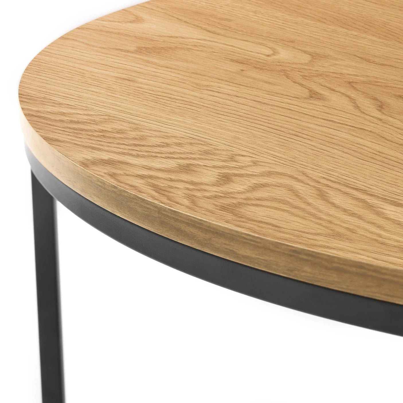Oak round nesting coffee table top with wood grain and black metal leg detail