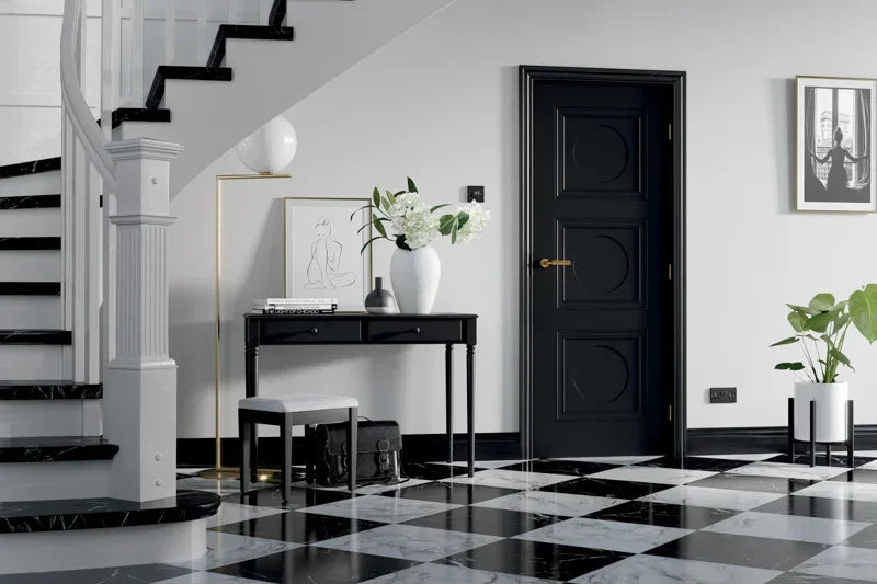 Black Antwerp 3 panel internal door with gold handle in modern hallway