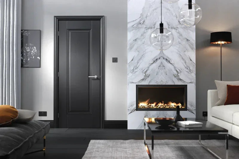 Black interior door in modern living room with marble fireplace and glass pendant lights
