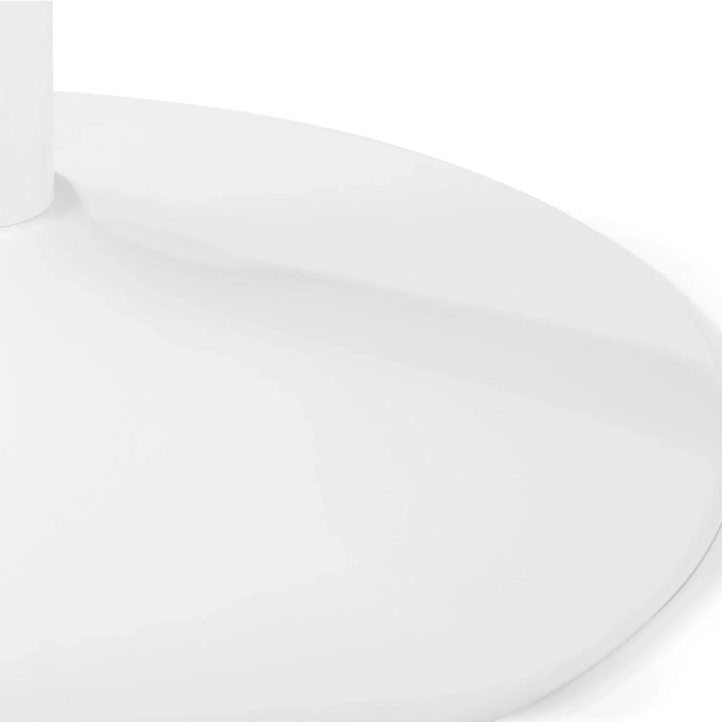Close detail of white table base with smooth circular surface