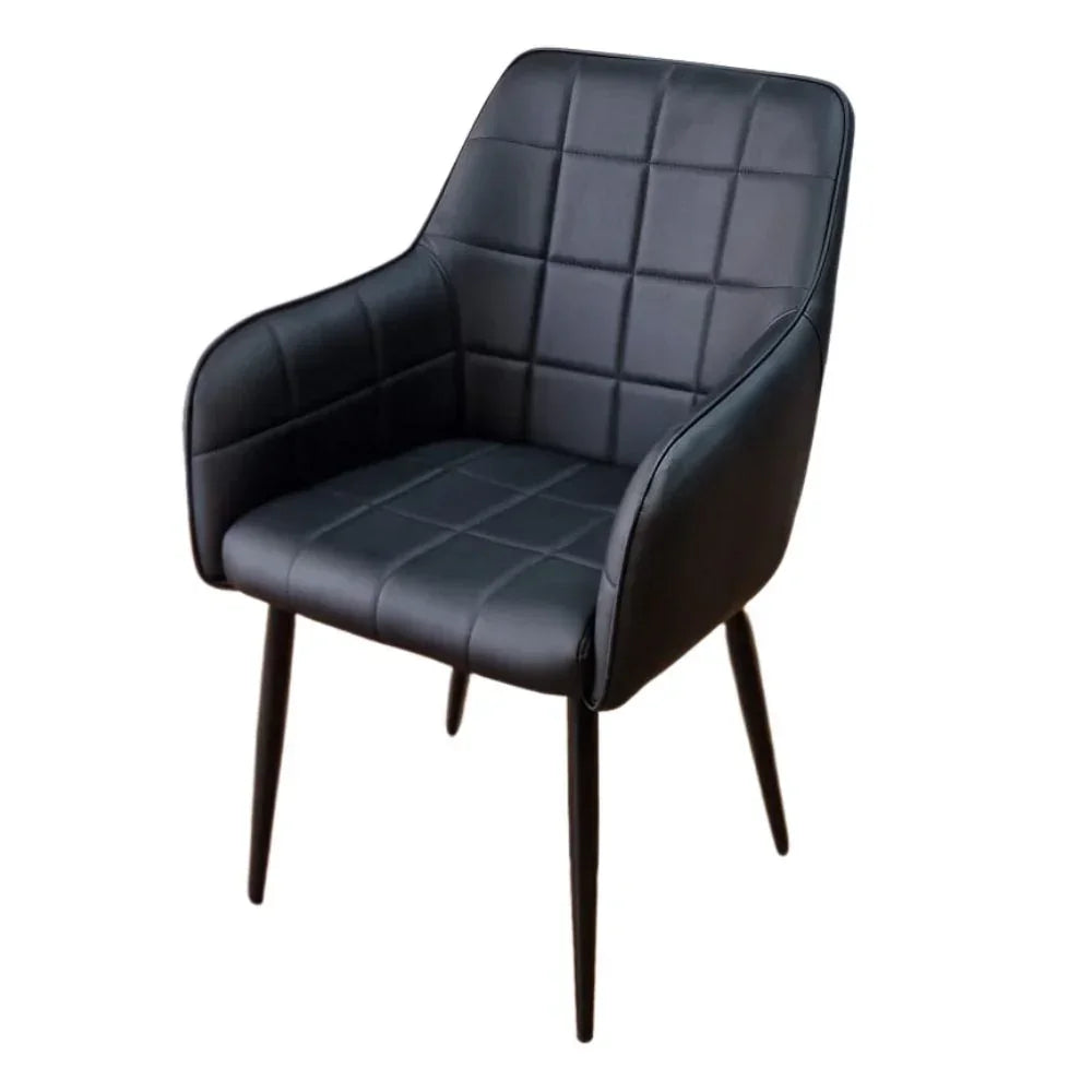 Black dining chair with armrests, quilted upholstery and slim metal legs
