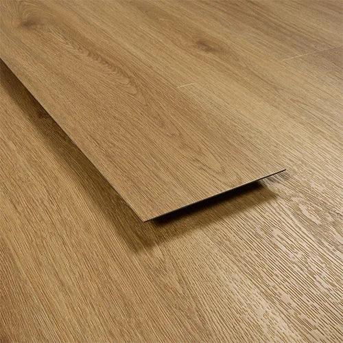 brushed oak laminate flooring plank with wood grain texture on flat surface