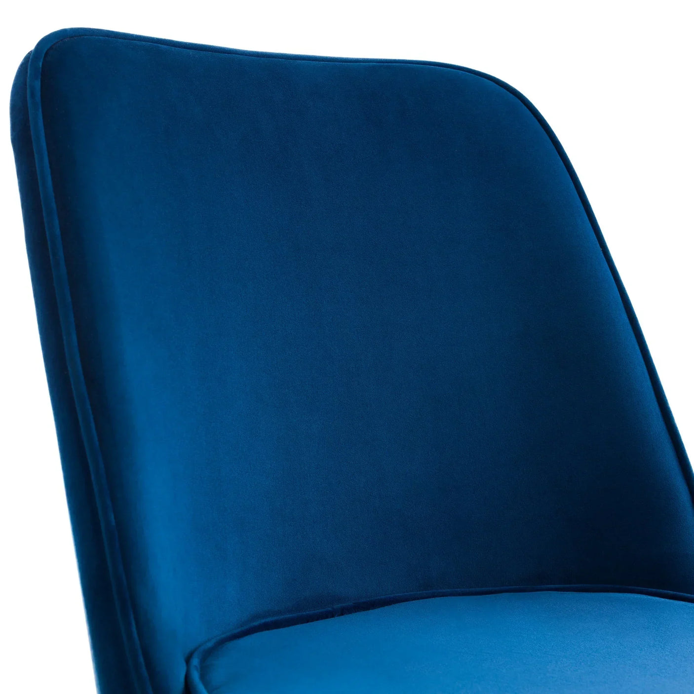 Close up of blue velvet chair backrest and seat with smooth curved lines