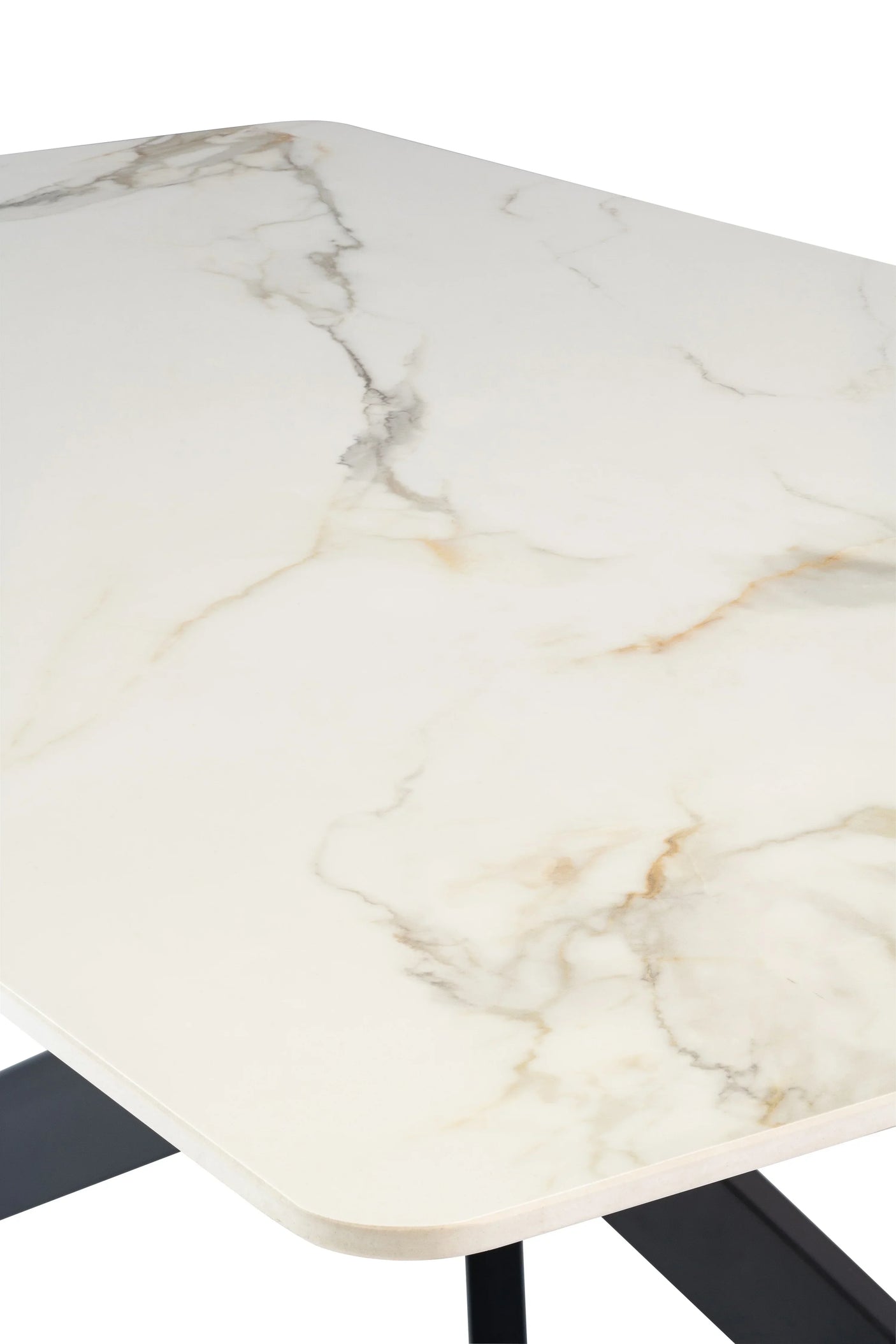 Ceramic dining table close-up with marble effect top and black metal legs