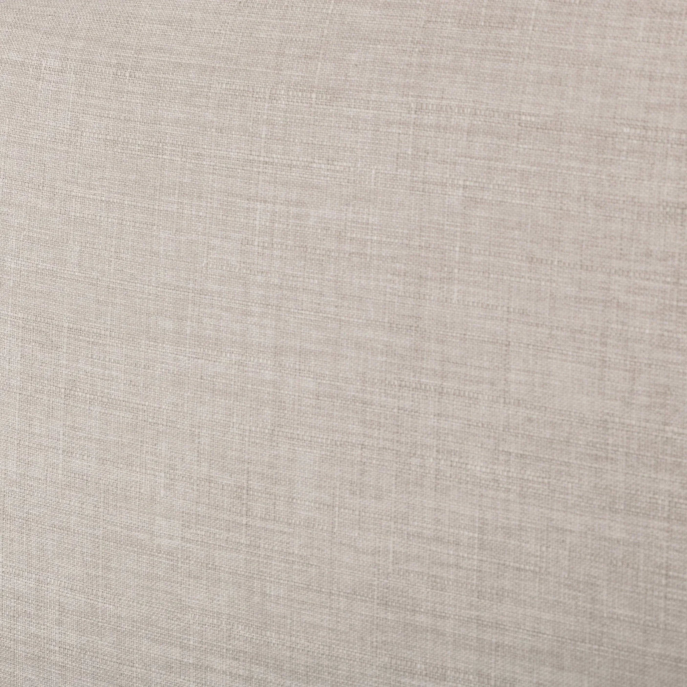 Closeup of beige upholstered double bed fabric texture