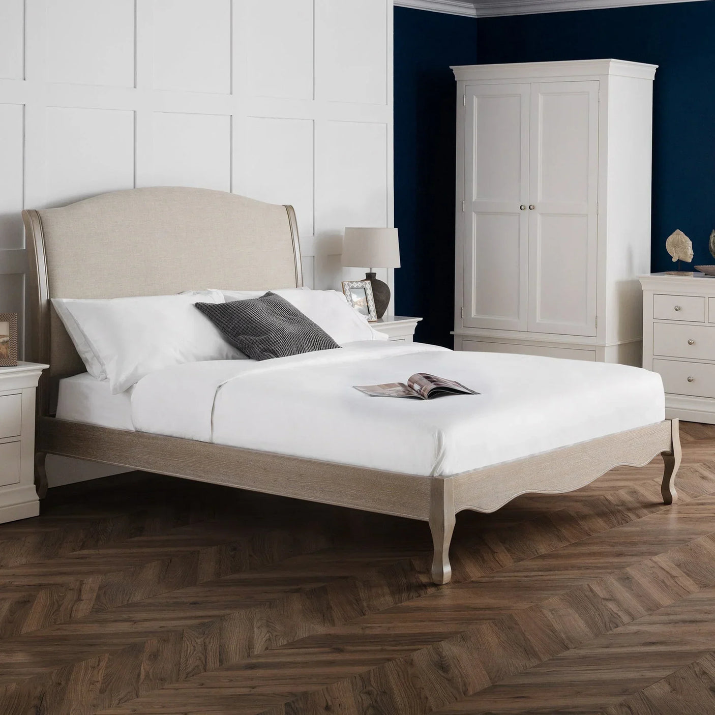Camille 135cm double bed with fabric headboard in a modern bedroom with white furniture