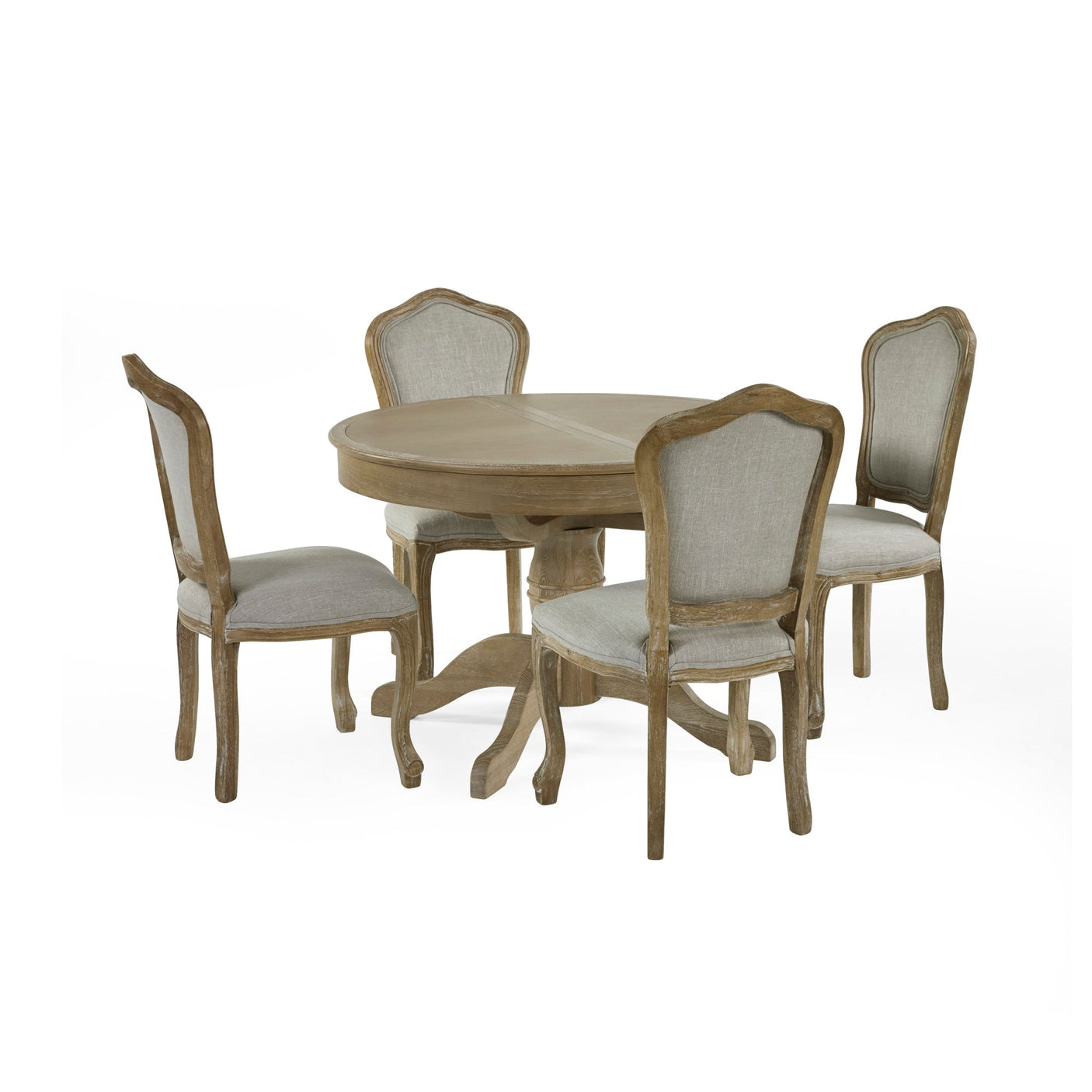 Round wooden dining table surrounded by four beige upholstered dining chairs, two with cane backs on white background.