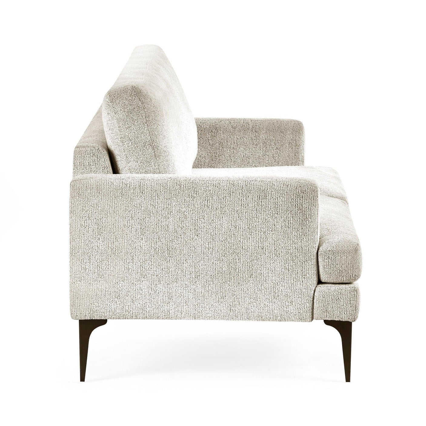 Side view of beige fabric sofa with slim black metal legs