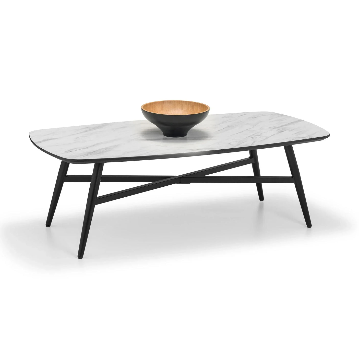 White marble coffee table with black legs and decorative wooden bowl on top