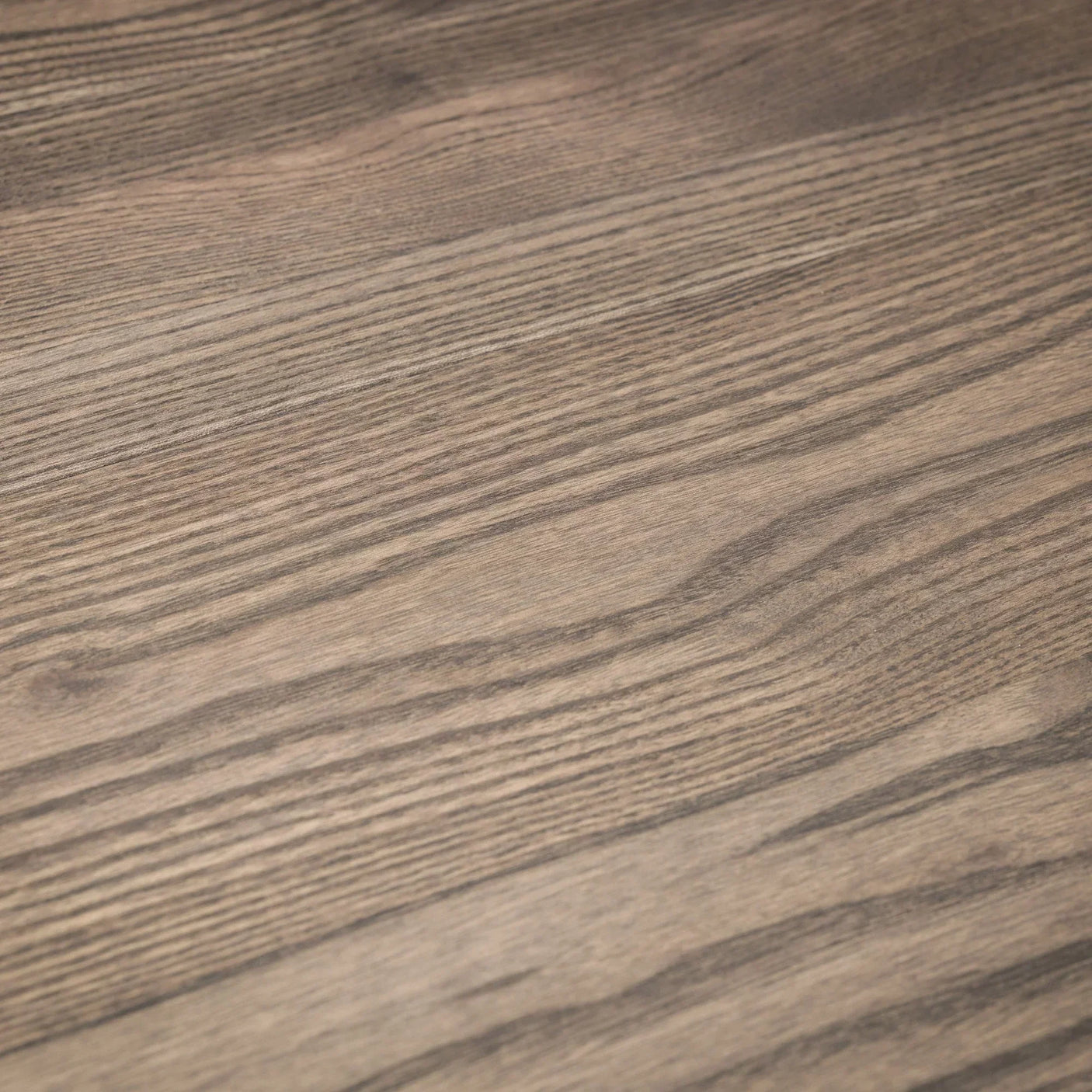 Close-up of wood grain dining table surface with natural brown finish
