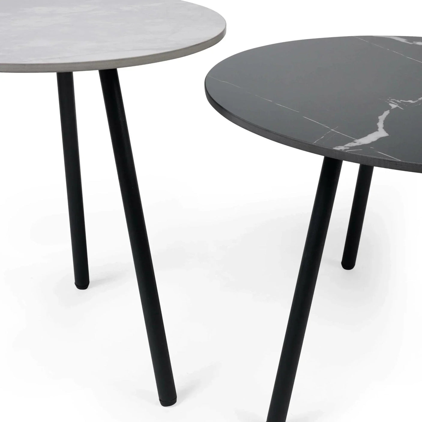 Round marble effect side tables with black metal legs, shown in light and dark finishes