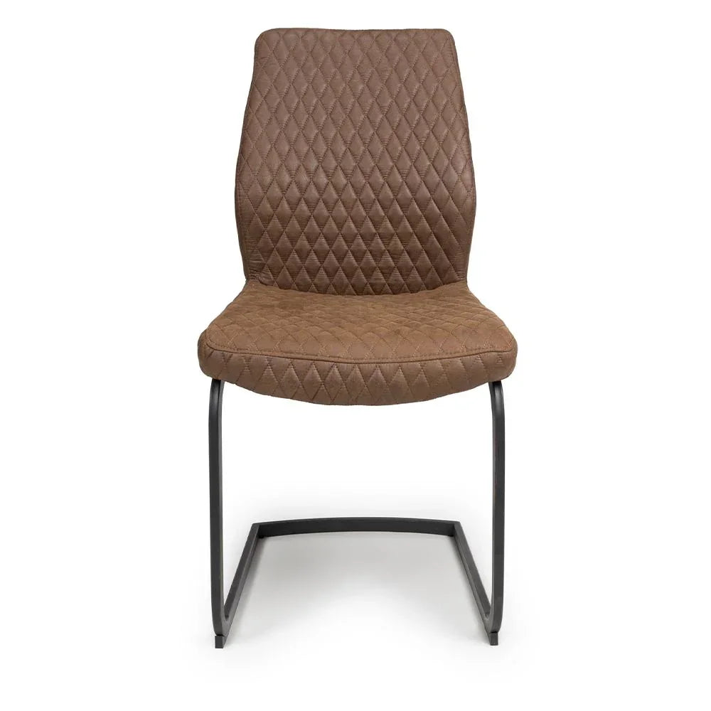 Brown quilted dining chair with black metal cantilever legs, front view