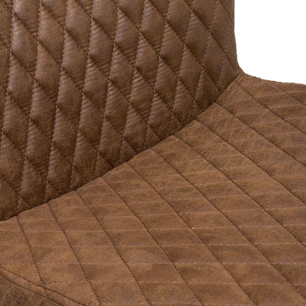 Closeup of brown upholstered chair seat with diamond quilted stitching detail